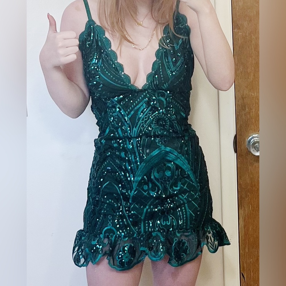PrettyLittleThing Emerald green mini dress with deep v neck and ruffle details